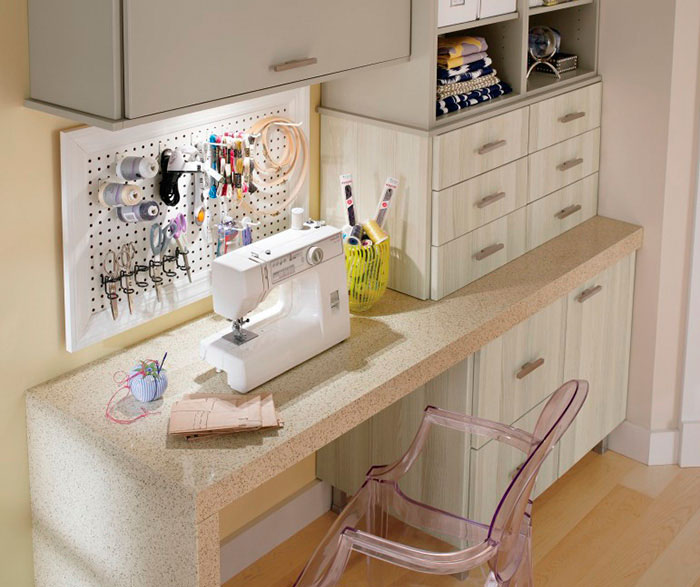 Craft room cabinets in thermofoil by Kitchen Craft Cabinetry